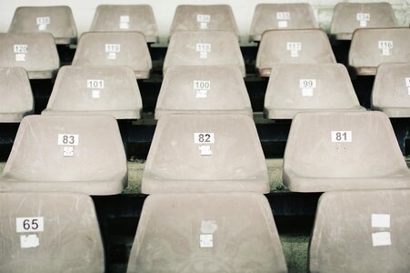 Empty Plastic Gray Chairs at the Stadium