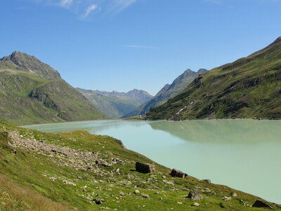 Turquoise blue waters in Silvretta Stausee Lake photo
