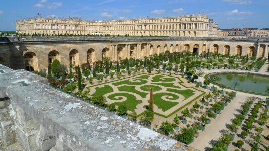 The Palace of Versailles is a royal chateau with beautiful garden photo