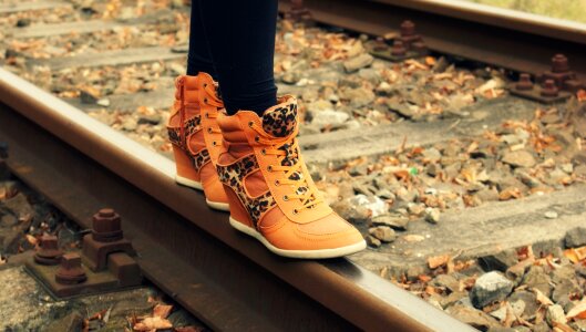 Railway shoes feet photo