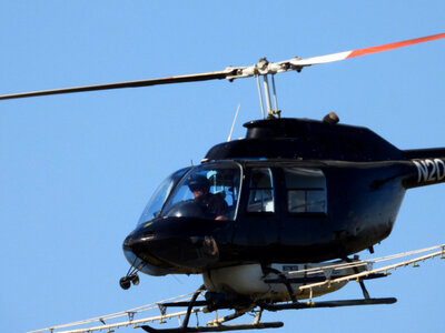 Helicopter flying over Horicon Marsh photo