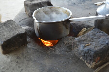 Fire cooking pot photo