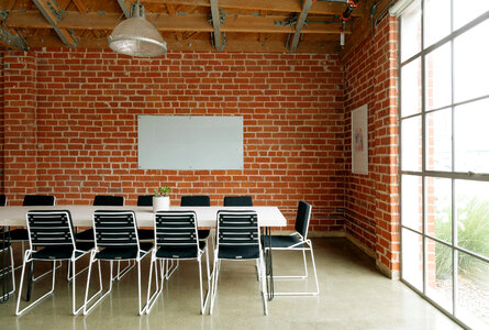 Conference Room in a Loft Style with Red Brick Walls photo