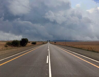 Asphalt clouds freeway photo