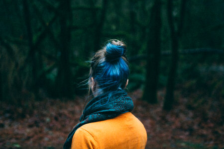 Woman with Blue Hair Standing Back photo