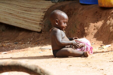 Small boy toy poverty photo