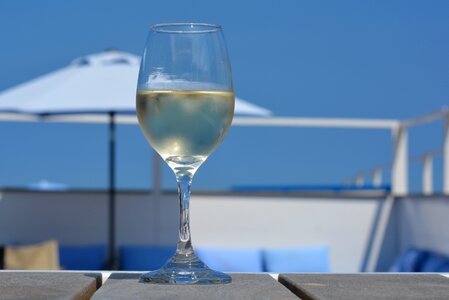 Parasol blue sky beach bar photo