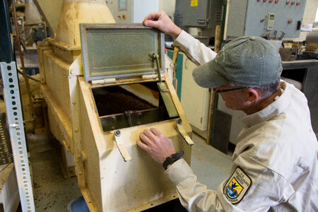 Fish Nutritionist dries and inspects fish food-1 photo