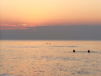 sun setting over Lake View beach photo