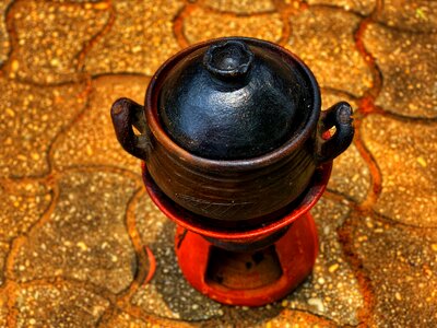 People clay stove cauldron photo