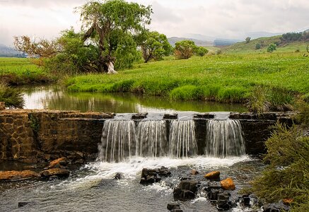 Weir dam flowing water photo