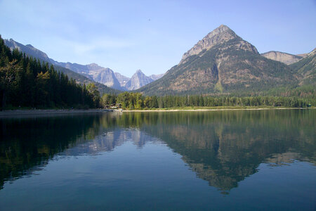 Scenic landscape with mountains and lake at Goat Haunt Station in Glacier National Park photo