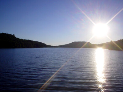 Sun over Christine Lake in Shark, New Hampshire