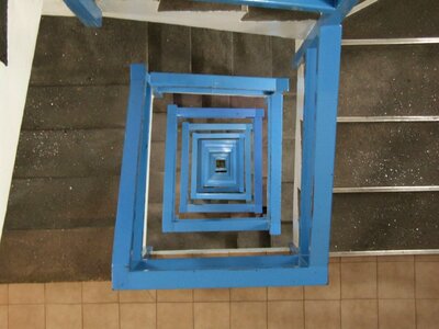 Blue railing stairwell
