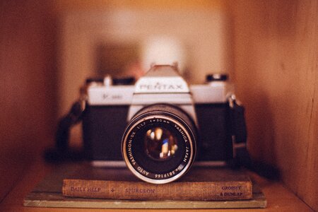 Slr single-lens reflex camera book shelf photo