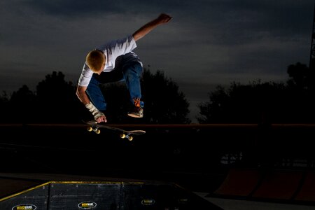 Jump skateboarder trick photo