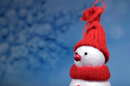 Snowman with hat and scarf photo