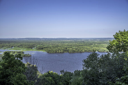 Mississippi River landscape under blue sky