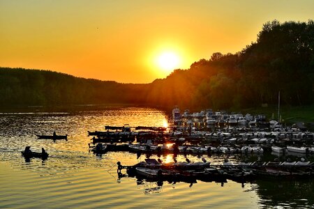 Evening fisherman forest photo