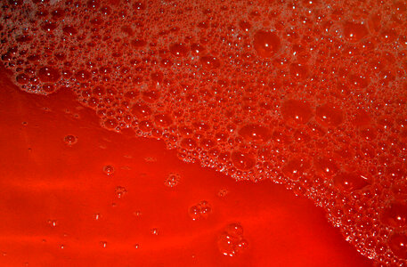 Red water with bubbles photo
