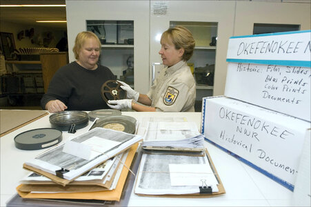 Service employees archive historical records 