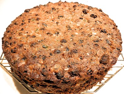 Cherries raisins brown cake photo