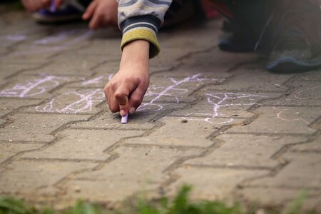 Hand pavement drawing chalk photo