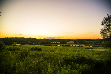 Orange Sunset and landscape at Indian Lake County Park photo