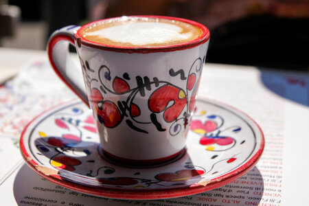 Cup of Coffee on a Plate photo