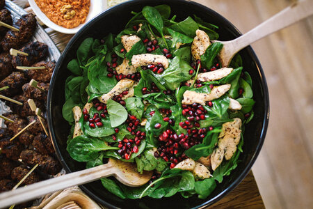 Salad with Baby Spinach, Pomegranate and Chicken photo