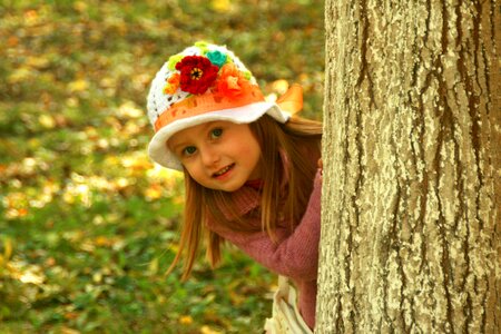 Behind the tree