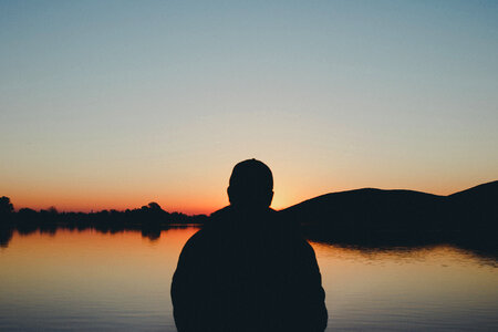 Man Silhouette at Sunset photo