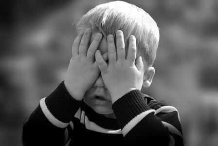 Child hands hide