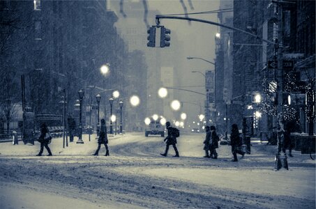 People pedestrians lamp posts