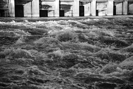Black and White Close up of rushing water of the river photo