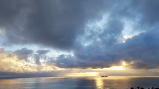 Sea sun clouds photo