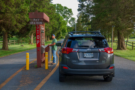 Visitor paying fee at fee station-5