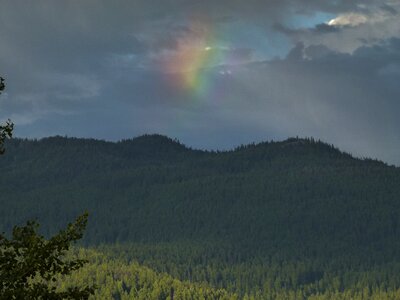 Clouds rainbow canim lake photo