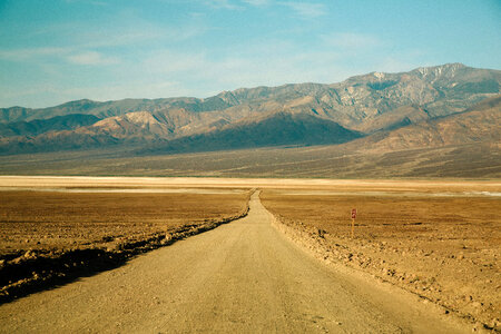Roadway through the desert at Death Valley National Park, Nevada photo