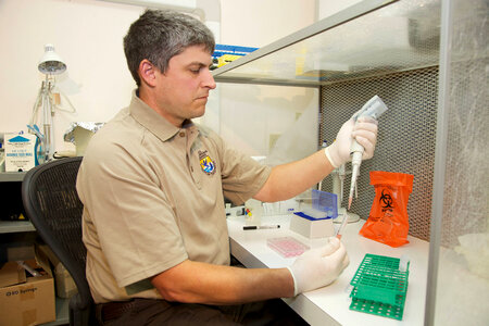 Scientist at Lower Columbia River Fish Health Center-4 photo