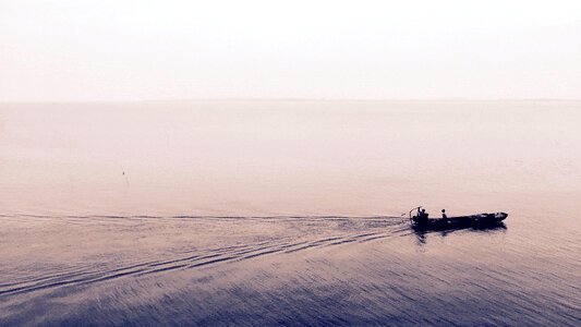 Boat on the lake in Suzhou, China photo