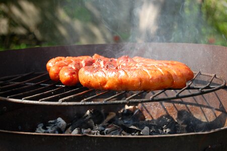 Sausages grill burning photo