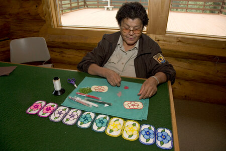 Native American Service employee working on crafts at Tetlin National Wildlife Refuge