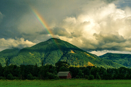 Rainbow behind the Mountain landscape photo