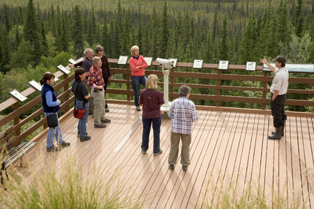 U.S. Fish and Wildlife Service employee talking to visitors at Tetlin National Wildlife Refuge