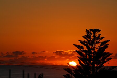 Dawn ocean orange sky photo