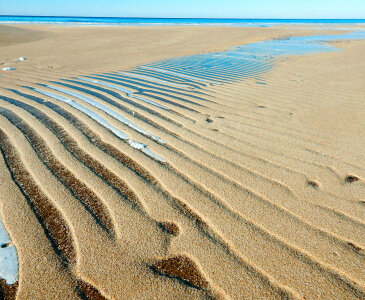Sand layers on the beach photo