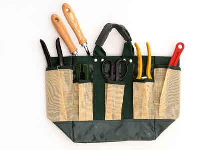 Detail of gardening tools in tool bag - outdoor