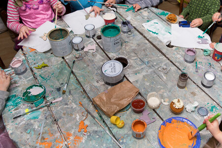 Children are Painting at the Table photo