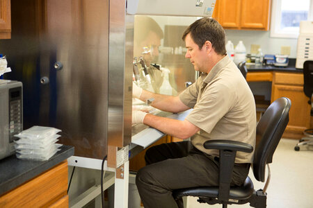 FWS biologist propagates freshwater mussels in a labratory-2
